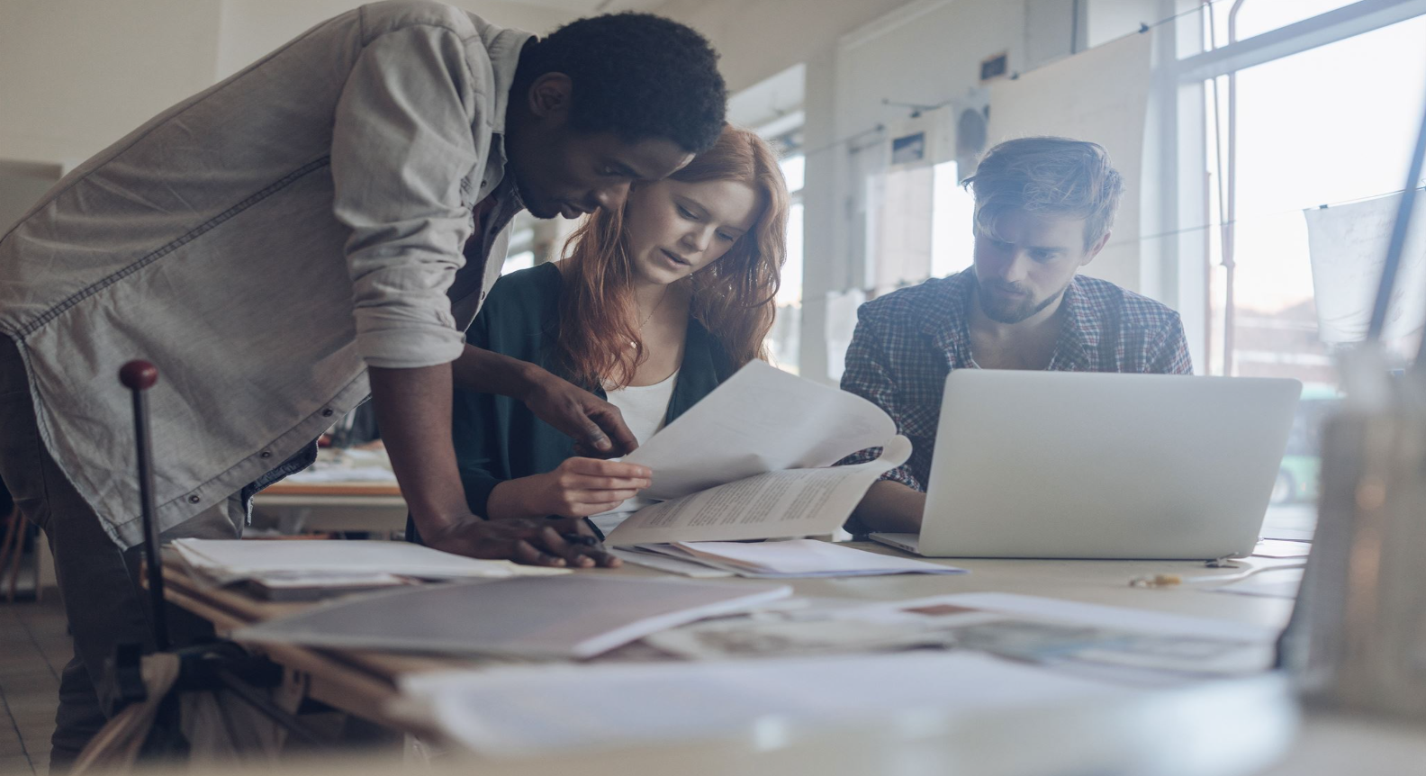 Professional team collaborating on data centre projects